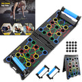 Black foldable push-up board with blue and black handles, color-coded slots, and workout guides.