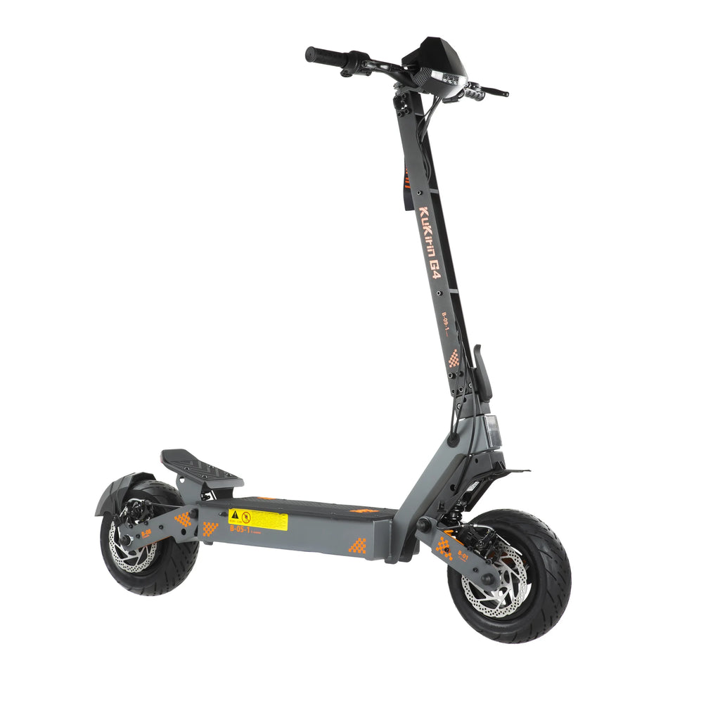 Gray KuKirin G4 electric scooter with fat tires, dual disc brakes, wide deck, and orange accents on a white background.