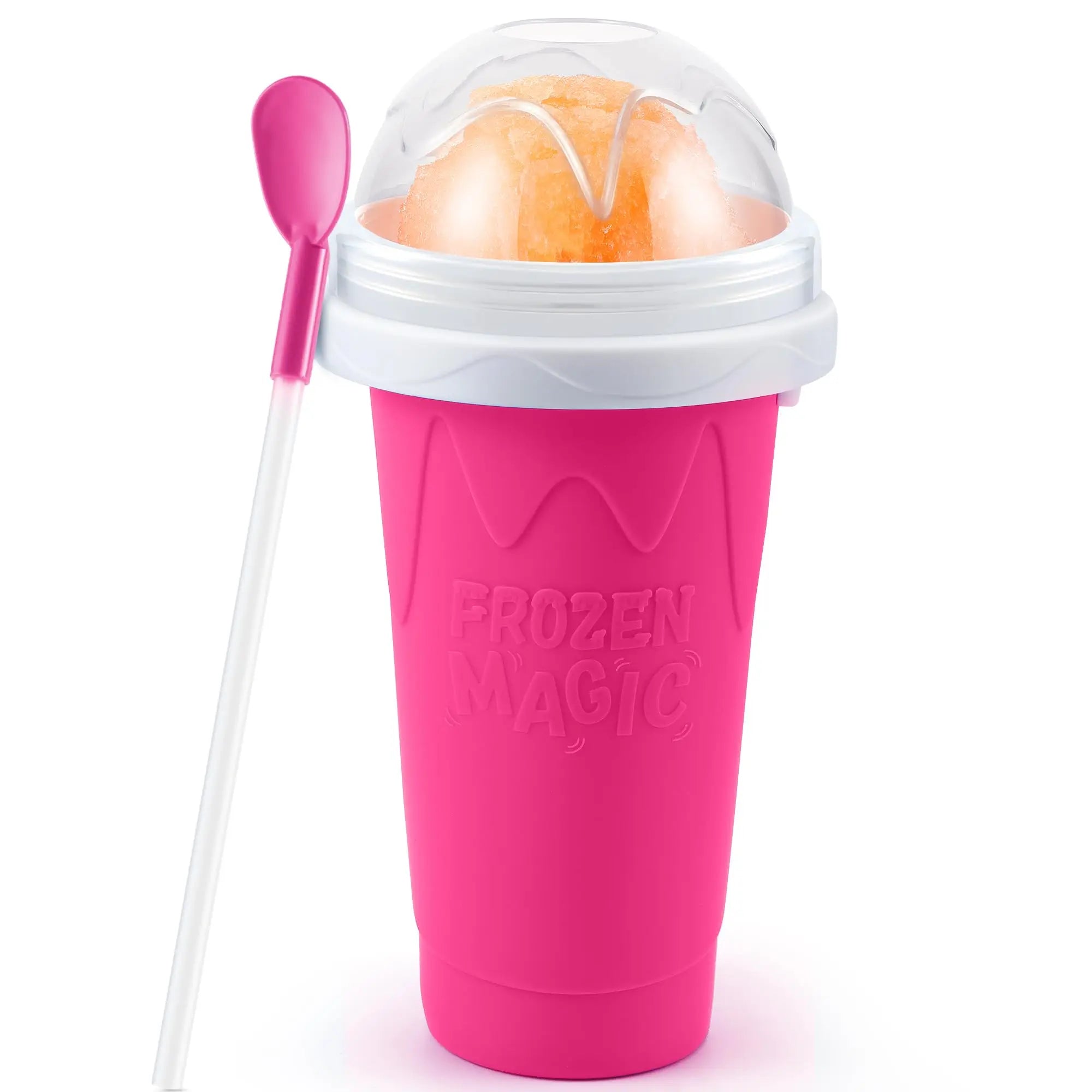 Bright pink DIY slushy squeeze cup with a white lid, clear dome, orange slushy inside, and matching pink spoon-straw.