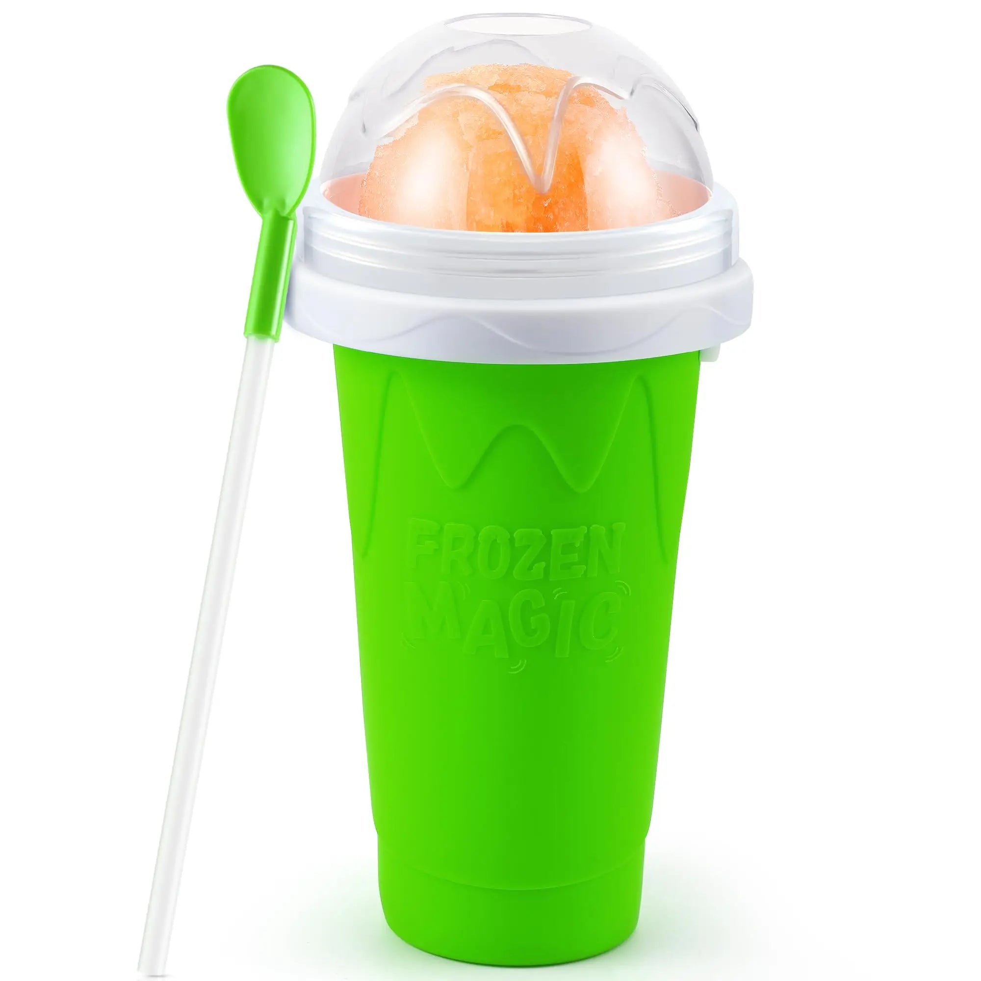 Bright green squeeze slushy maker cup with clear dome lid, orange slush inside, and a matching green spoon-straw.