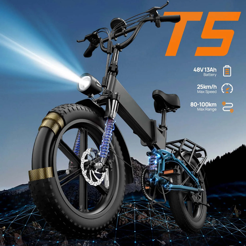 Black electric mountain bike with thick fat tires, front headlight on, and rear rack outdoors.