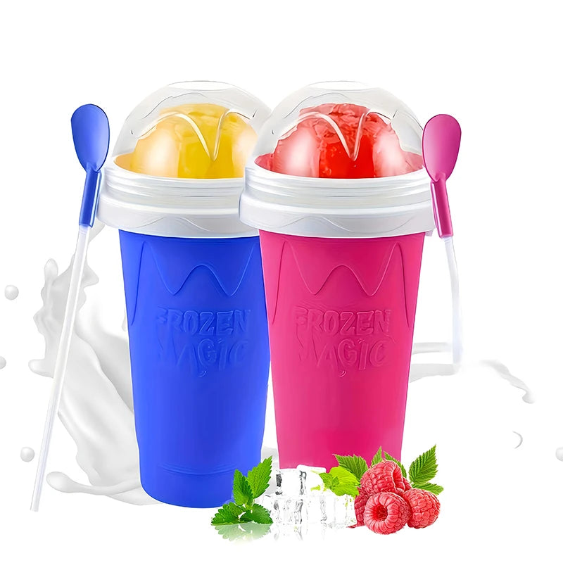 Two slushy maker cups in blue and pink, each with a clear lid, straw-spoon, and vibrant fruit-flavoured slush inside.