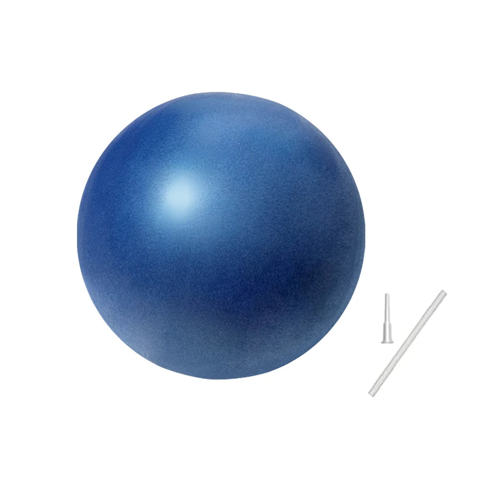 A smooth, royal blue Pilates exercise ball shown with its included inflation straw and plug.
