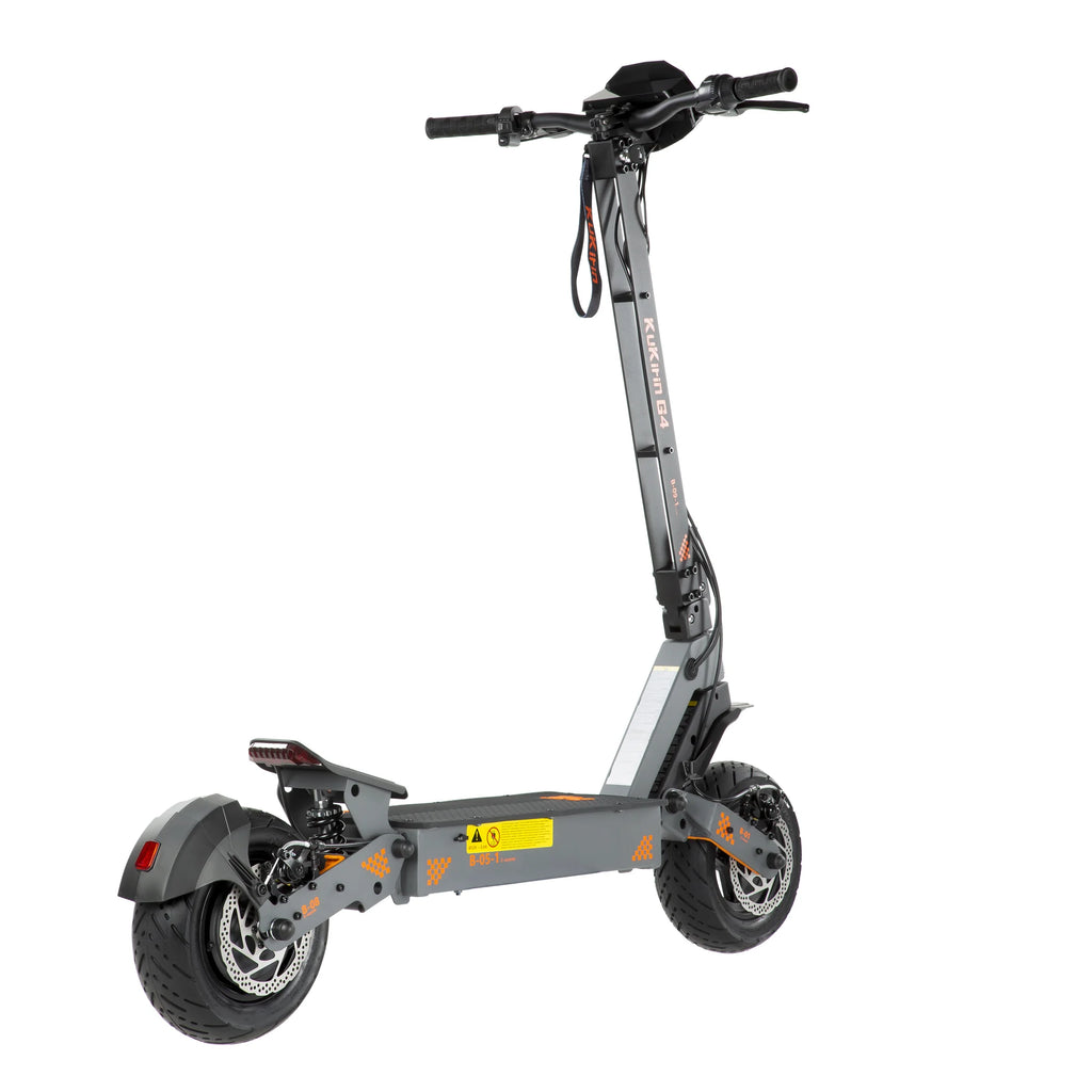 KuKirin G4 gray electric scooter with 11-inch fat tires, wide deck, disc brakes, and handlebars on a white background.