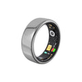 Sleek silver smart ring, showing interior health and sleep tracking sensors with glowing green and orange lights.