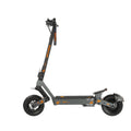 Dark gray Kukirin G4 electric scooter with 11-inch fat tires, orange branding, handlebars, and a wide deck.