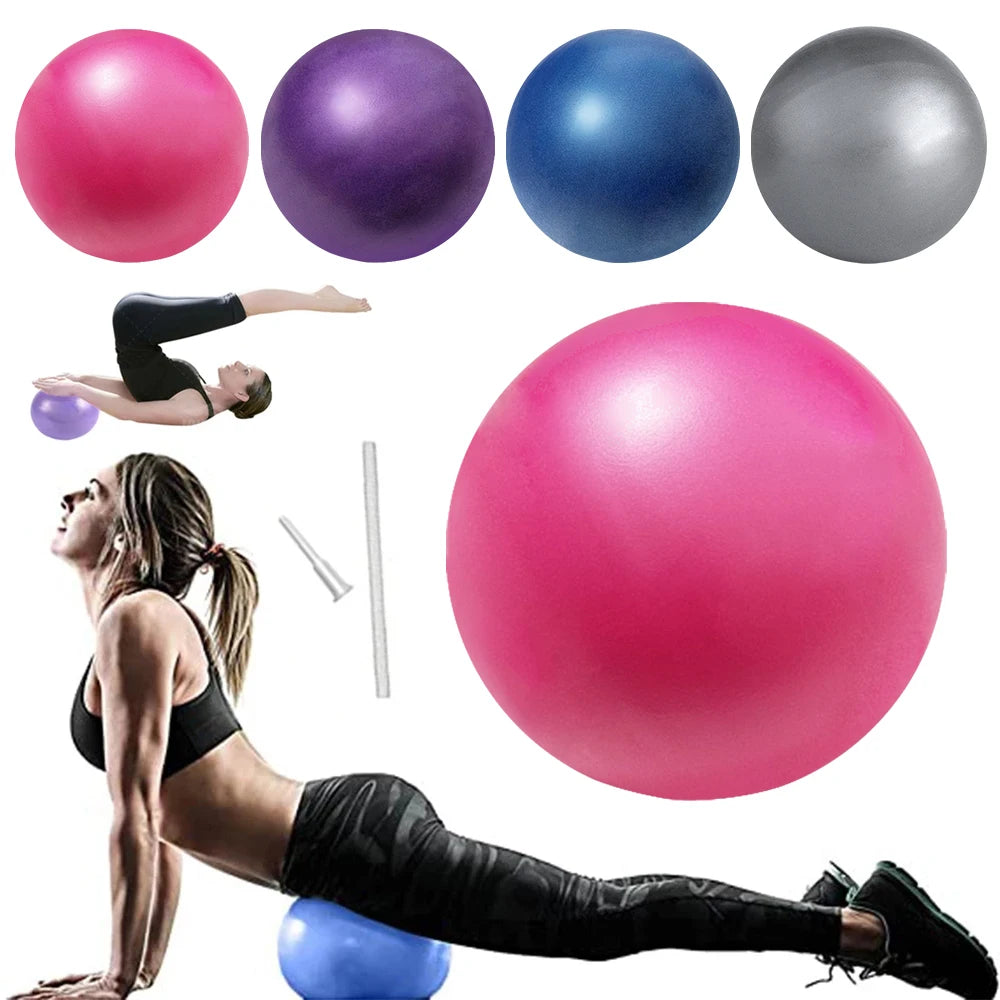 Four coloured pilates balls (pink, purple, blue, silver) with a woman using one for yoga exercise and an inflator.