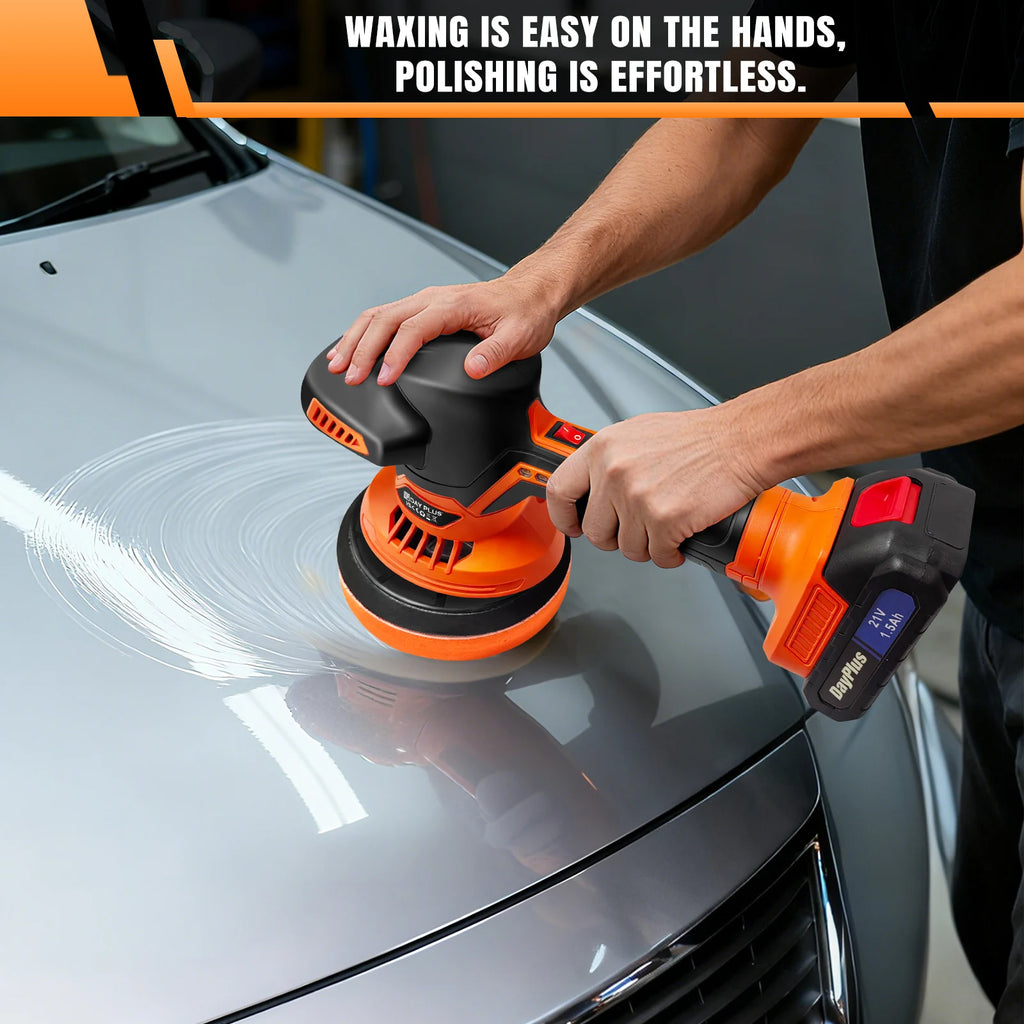 Orange and black cordless car polisher buffing a silver car hood, held with both hands.