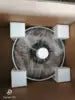 Electric bike hub motor wheel, silver finish, packed securely in a box with white protective foam corners.