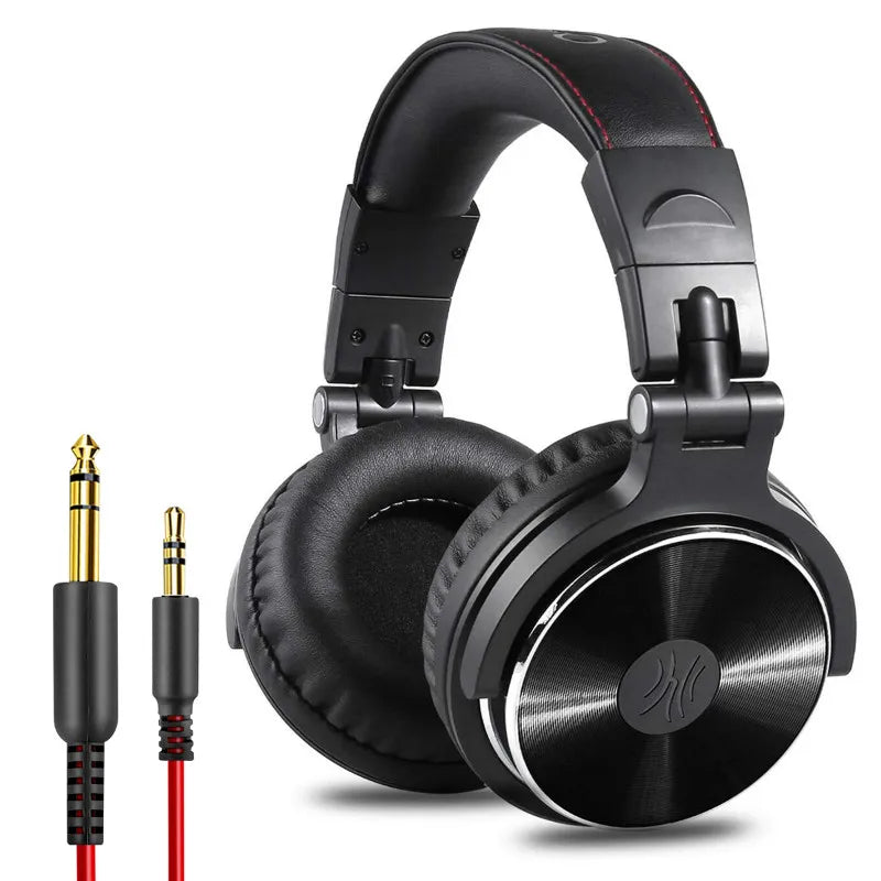 Black over-ear studio monitor headphones with a cushioned headband, red stitching, and two detachable audio cables.