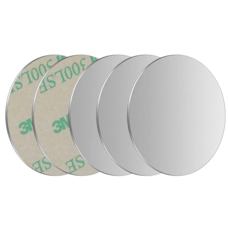 Five circular adhesive metal discs with a smooth silver finish, shown partially overlapping.