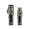 Two professional grey electric hair clippers with digital displays and ergonomic black grip handles.