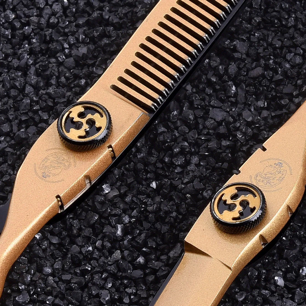 Professional 6-inch hairdressing scissors and thinning set in brushed gold with black detailing and ornate tension screws.