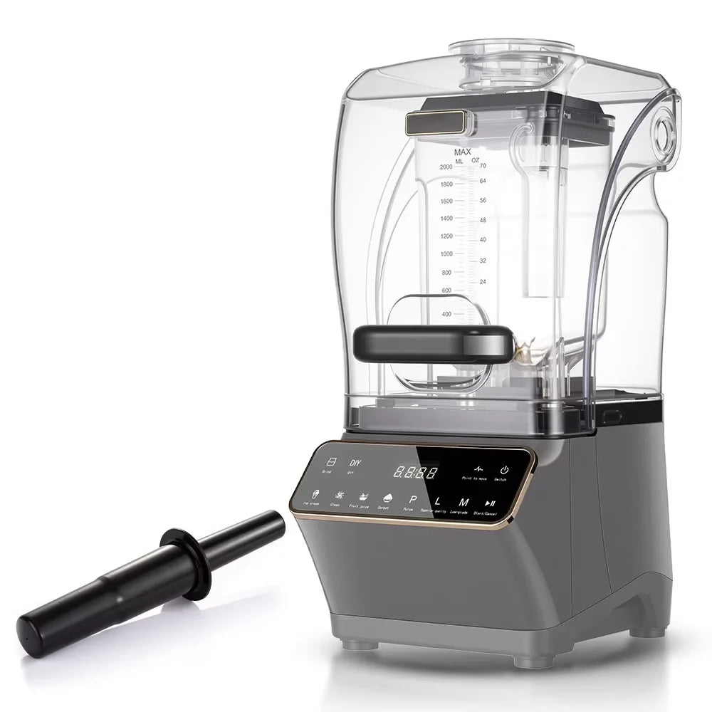 Grey professional blender with a clear sound-reducing enclosure, digital touchscreen display, and a black tamper tool.