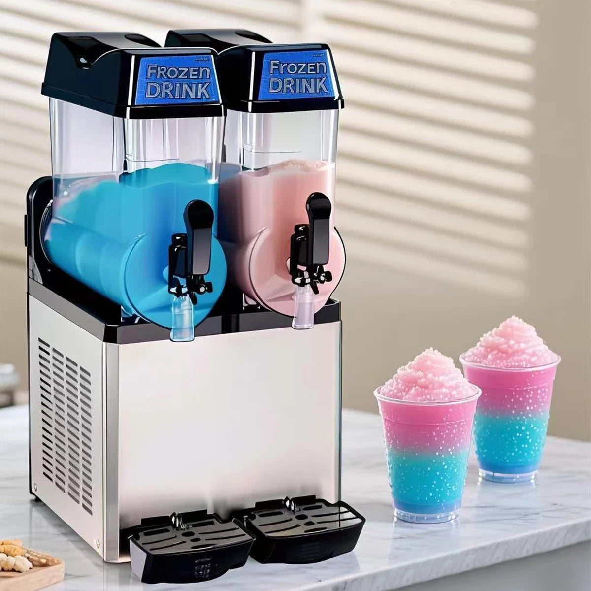 Double-bowl professional slush machine with frozen blue and pink drinks, featuring two serving cups.