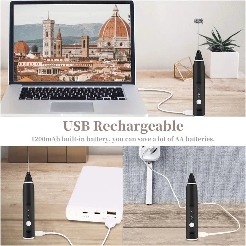 A black, handheld, USB-rechargeable electric milk frother with a white charging cable and power button.