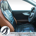 Black electric massage chair cushion with heat and vibration, fitted in a car seat with a 12V power adapter.