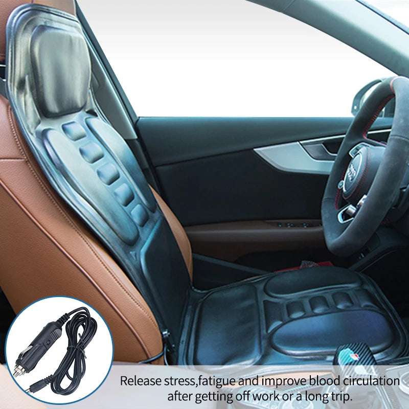 Black electric massage chair cushion with heat and vibration, fitted in a car seat with a 12V power adapter.