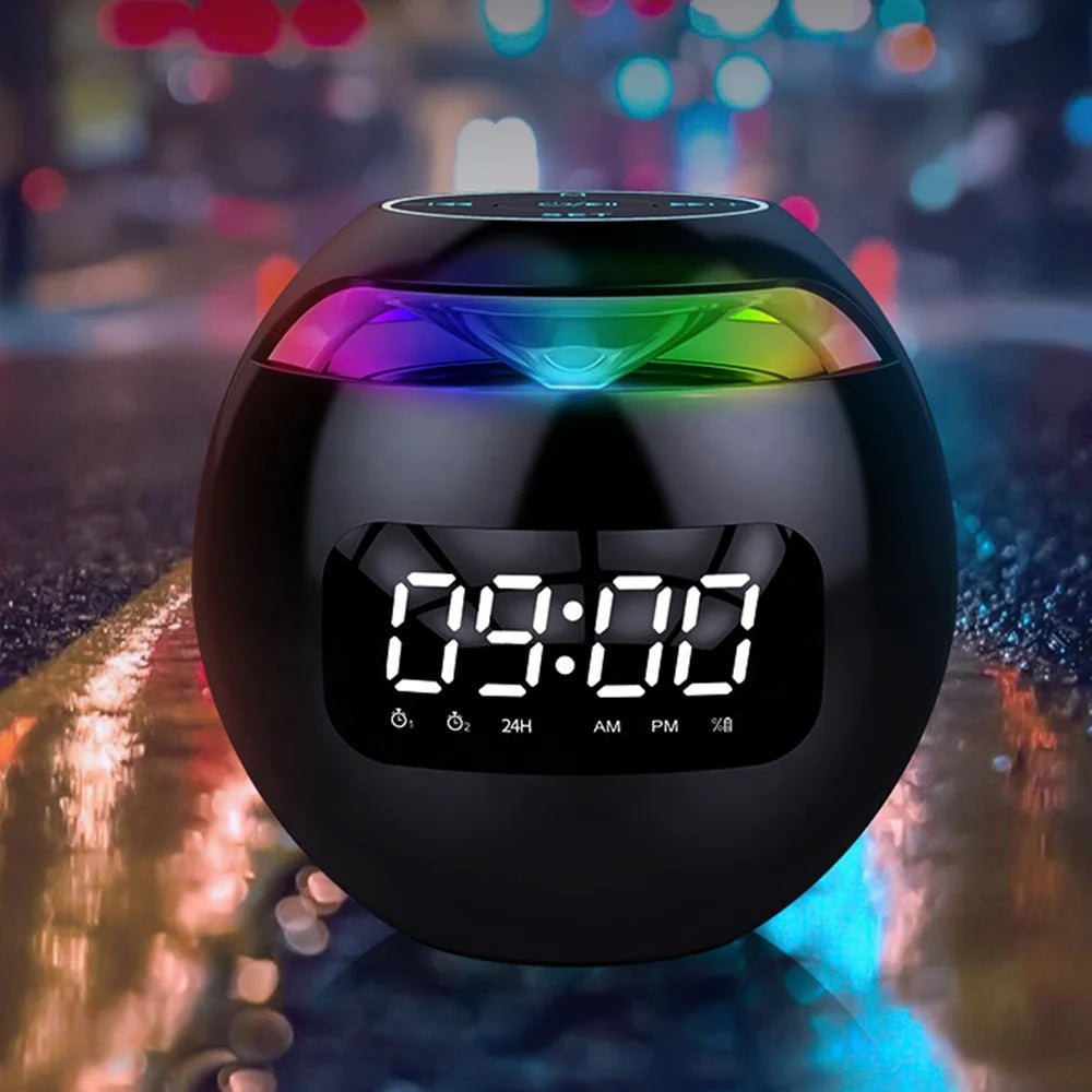 Black spherical Bluetooth speaker with a digital LED alarm clock display and vibrant, multicoloured top light ring.