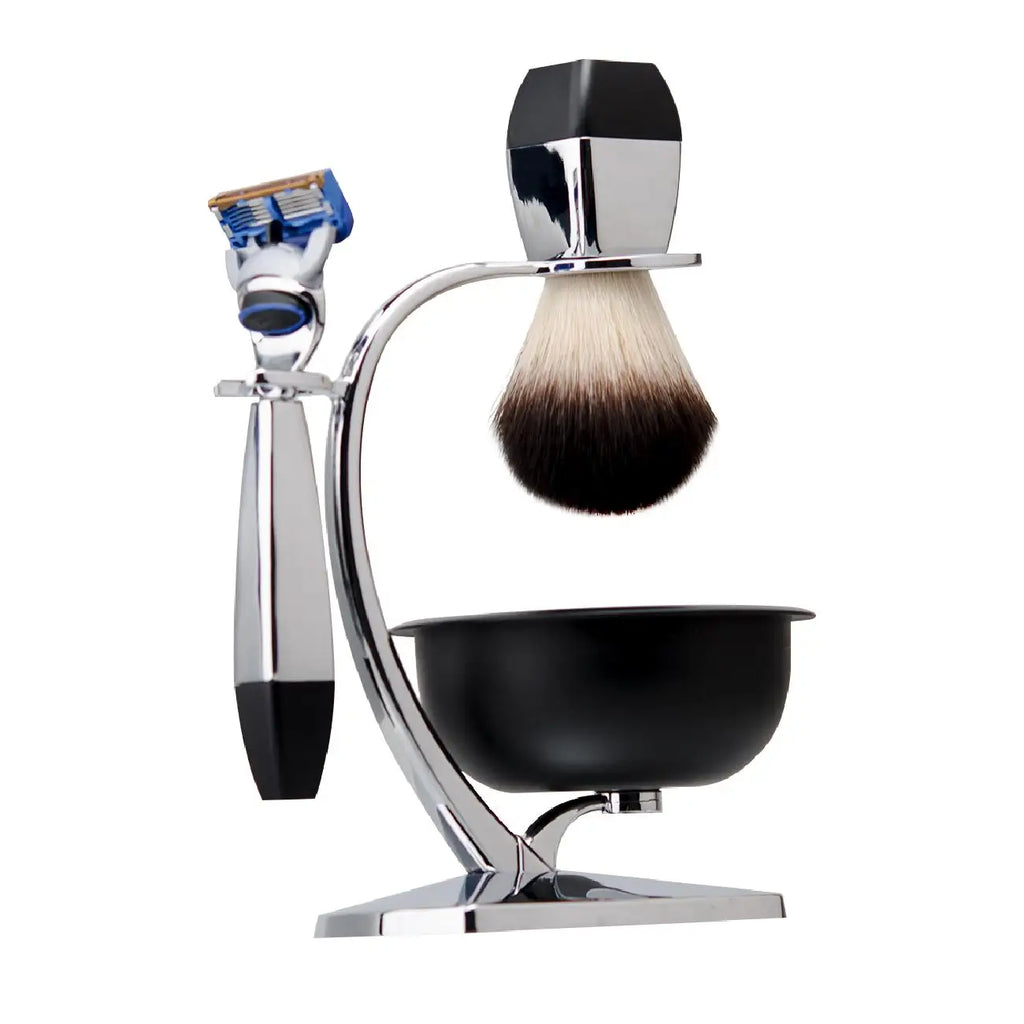 Men’s grooming set featuring a chrome razor and brush on a stand with a black shaving bowl, all in a modern style.