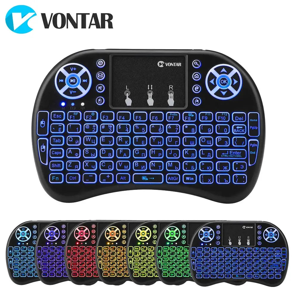 Compact black wireless keyboard with a central touchpad, multimedia buttons, and customisable backlit keys.
