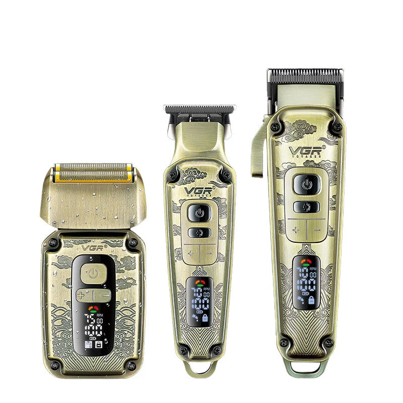 Three professional cordless gold hair clippers and a shaver with ornate patterns and digital LED display screens.