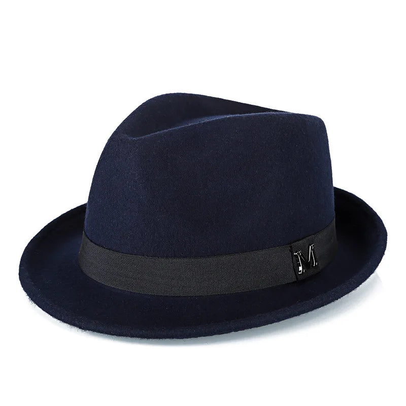 A classic navy blue wool felt fedora hat featuring a black ribbon band with a decorative silver metal detail.