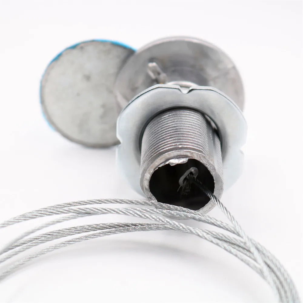 Silver steel deck cable railing fitting with a threaded post, washer, and attached stainless steel wire rope.