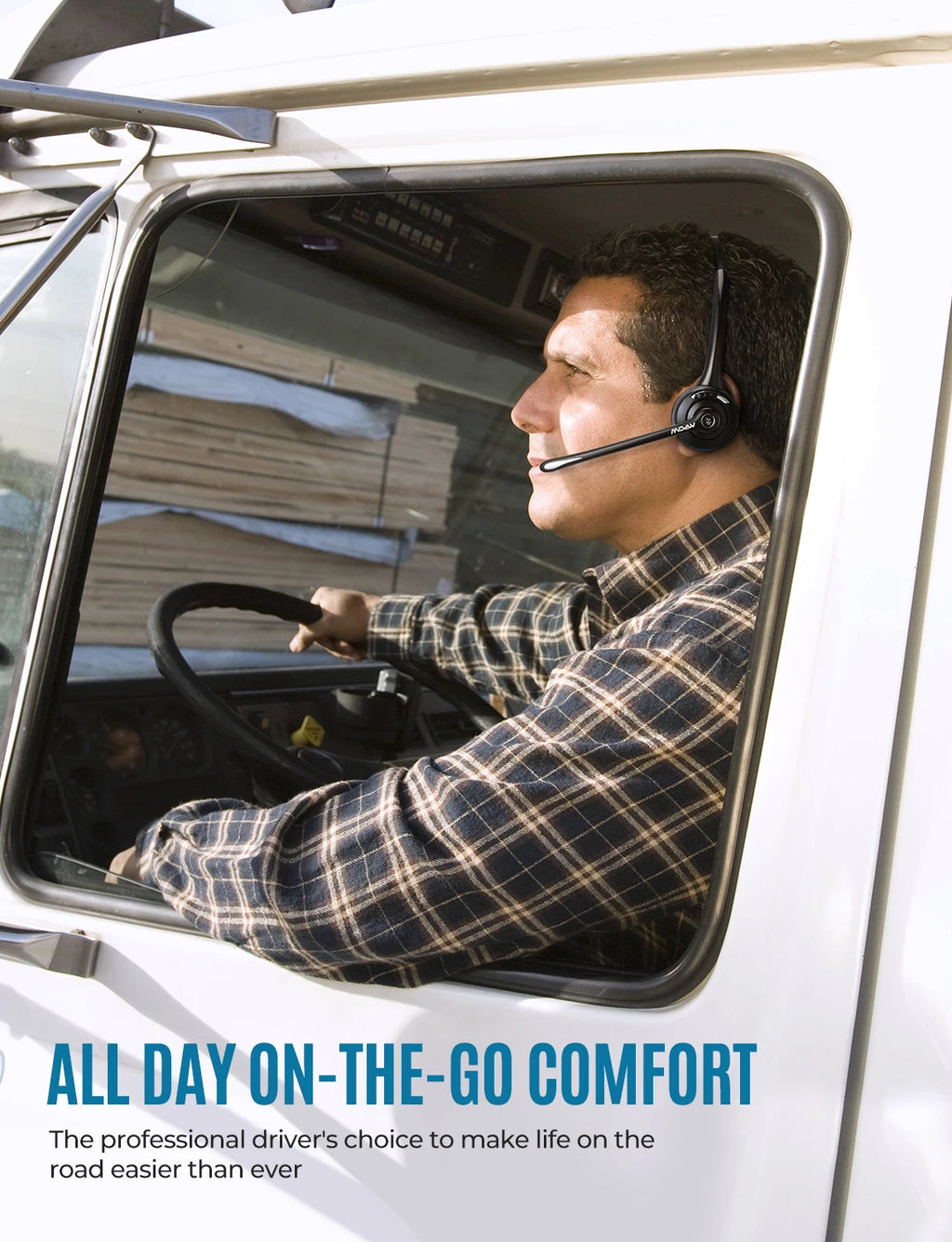 A man driving a lorry wearing a sleek, black wireless headset with a boom microphone for hands-free calls.