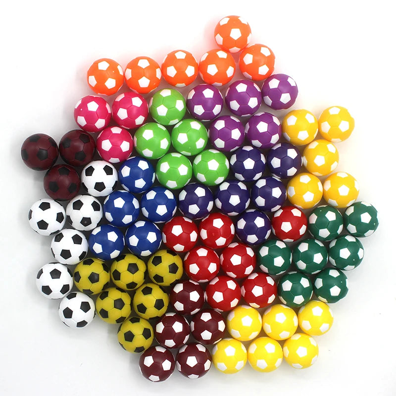 A large pile of colorful 36mm foosball balls in orange, pink, green, blue, red, yellow, and black-and-white.