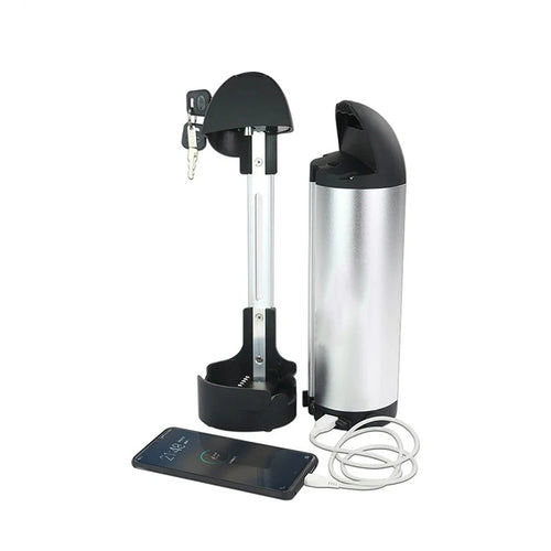 Silver e-bike battery with black housing and key lock, shown with a charging cable and smartphone.