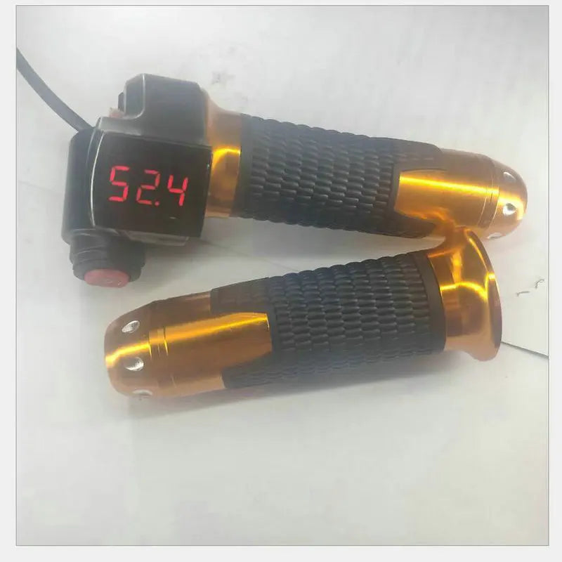 Black and gold e-bike twist throttle set with textured grips and a digital voltage display.