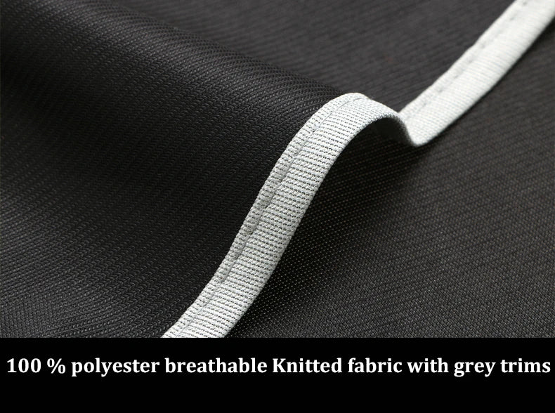 Close-up of durable, black breathable polyester fabric with a contrasting grey trim.
