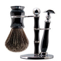 Luxury shaving kit featuring a black and chrome safety razor, synthetic badger brush, and matching stand.