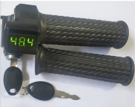 Black textured electric bike twist throttle featuring a green digital voltage display and integrated key ignition switch.