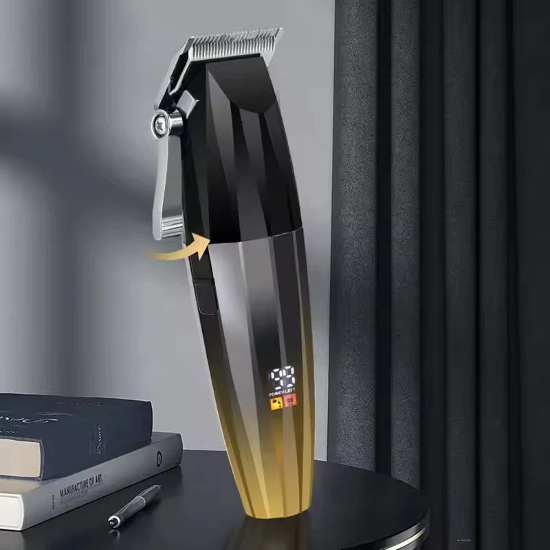 Cordless hair trimmer with a modern black and gold gradient finish, metallic T-blade, and digital battery display.