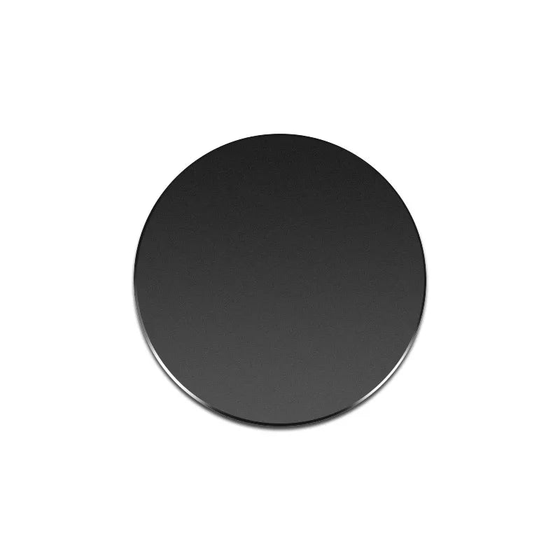 A solid, matte black circular disc with a clean, modern minimalist design.