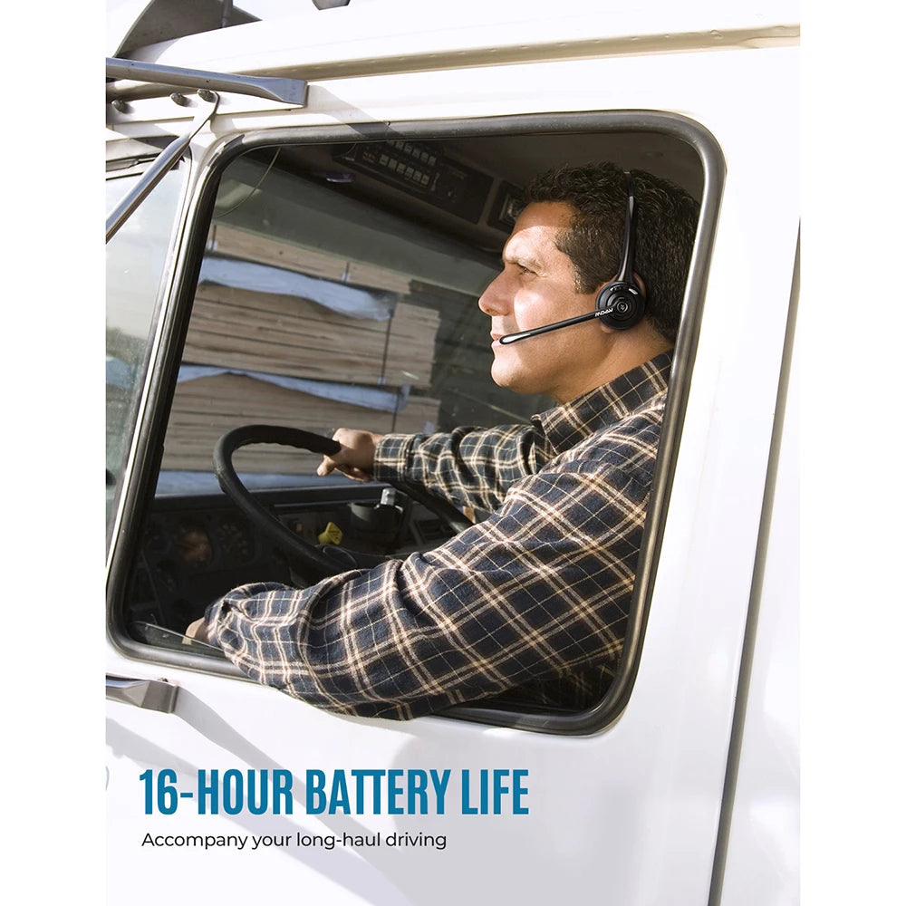 Black wireless single-ear headset with microphone worn by a driver in a truck, featuring a long-life battery.