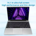 Slim silver laptop with a black keyboard and a vibrant purple digital art screen display.
