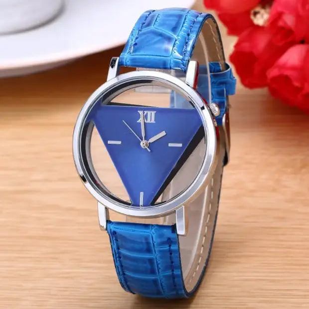 Women's analogue quartz watch featuring a unique triangular blue dial and a textured blue crocodile-effect leather strap.