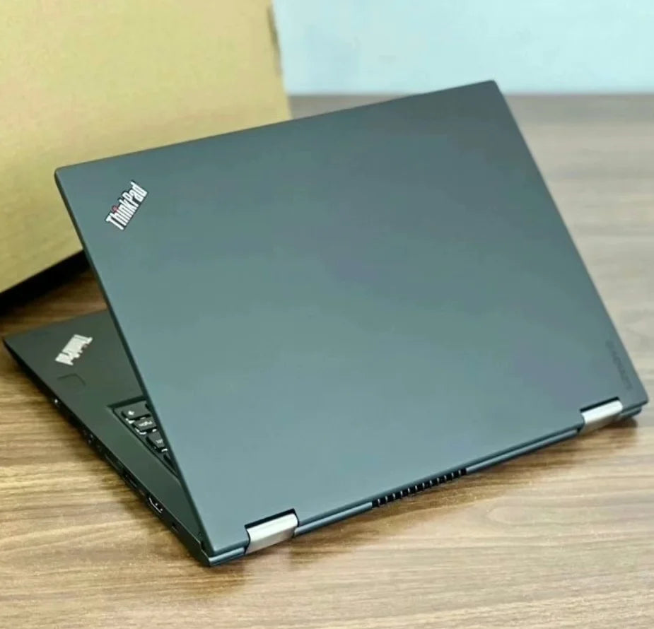 Sleek black 13.3-inch 2-in-1 touchscreen business laptop with metallic hinges, viewed from the lid.