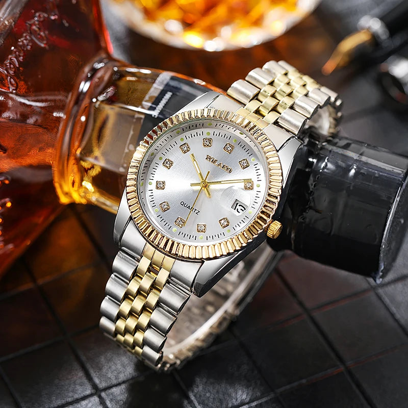 Luxury men's quartz watch with a two-tone gold and silver link strap, silver dial, and crystal hour markers.