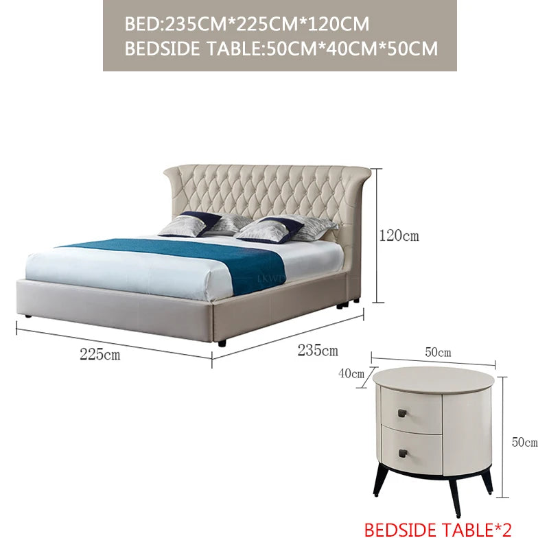 Luxury cream leather double bed with a tufted headboard, including two matching circular two-drawer bedside tables.
