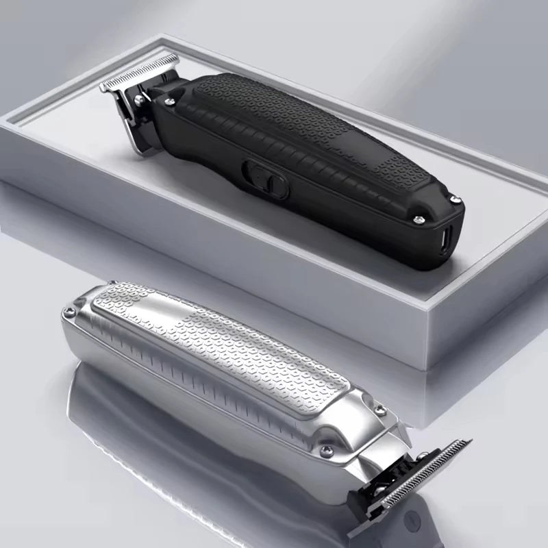 Professional cordless hair trimmers in black and silver finishes, featuring textured grip handles and precision blades.