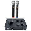 Two black wireless microphones with silver heads and a black audio mixer with rotary control knobs.