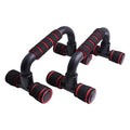 Pair of black and red foam-grip push-up bars for exercise, isolated on a white background.