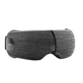 Foldable dark grey smart heated eye massager with a textured fabric finish and adjustable strap.