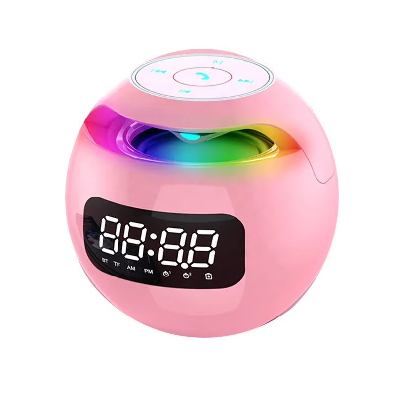 Pink spherical Bluetooth speaker with LED alarm clock display and colourful interior ring lighting.
