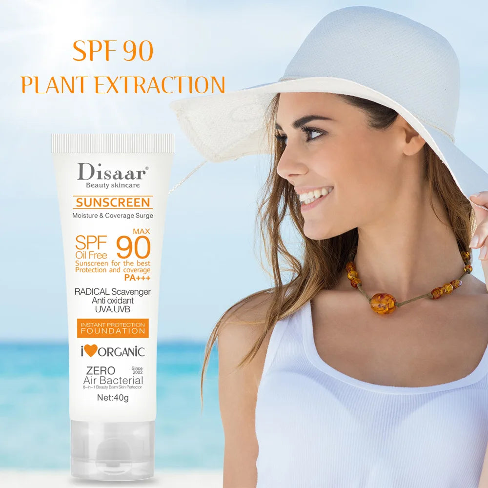 40g tube of oil-free SPF 90 sunscreen with plant extracts, displayed next to a woman in a sun hat on a beach.