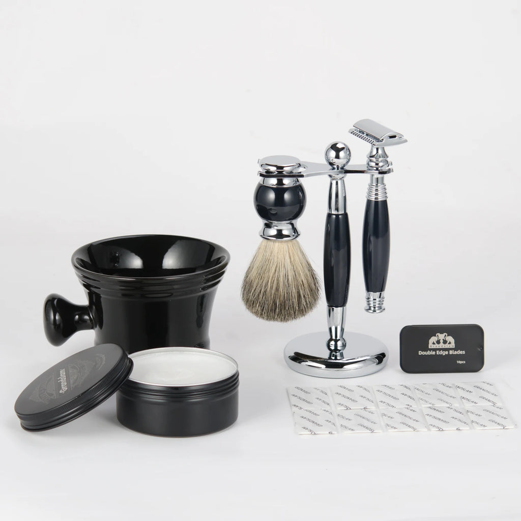Traditional wet shaving set with chrome and black razor, badger hair brush, stand, soap bowl and spare blades.